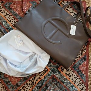 Brand new authentic large Telfar bag in chocolate. Original box with tag on.